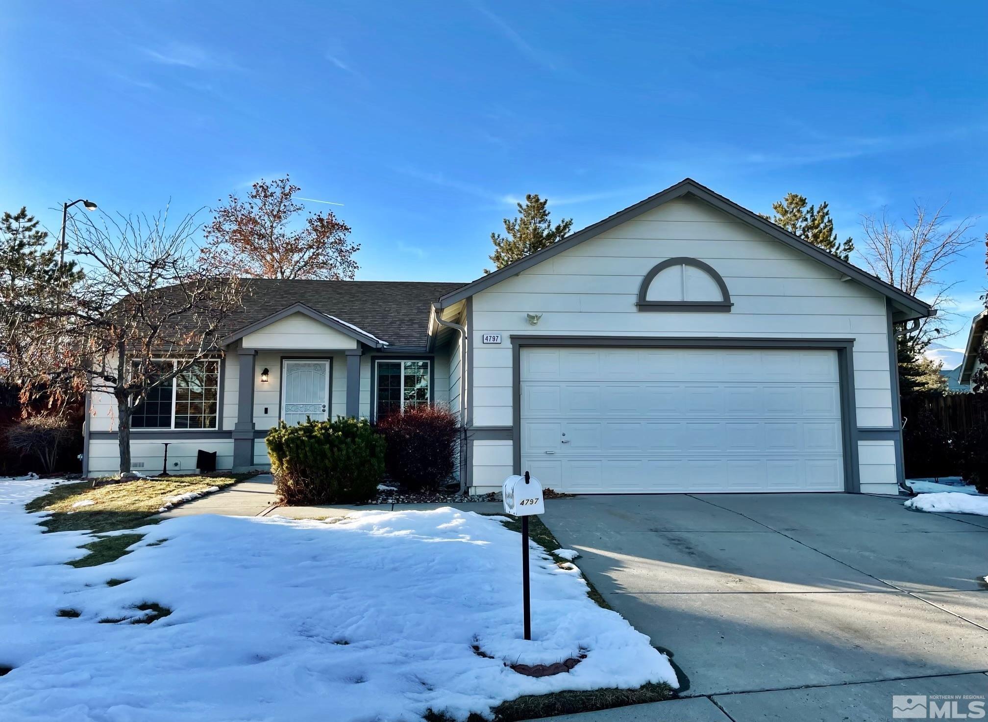 4797 Reno View Court Reno, NV 89523 - Photo 1 of 1 a front view of a house with a yard