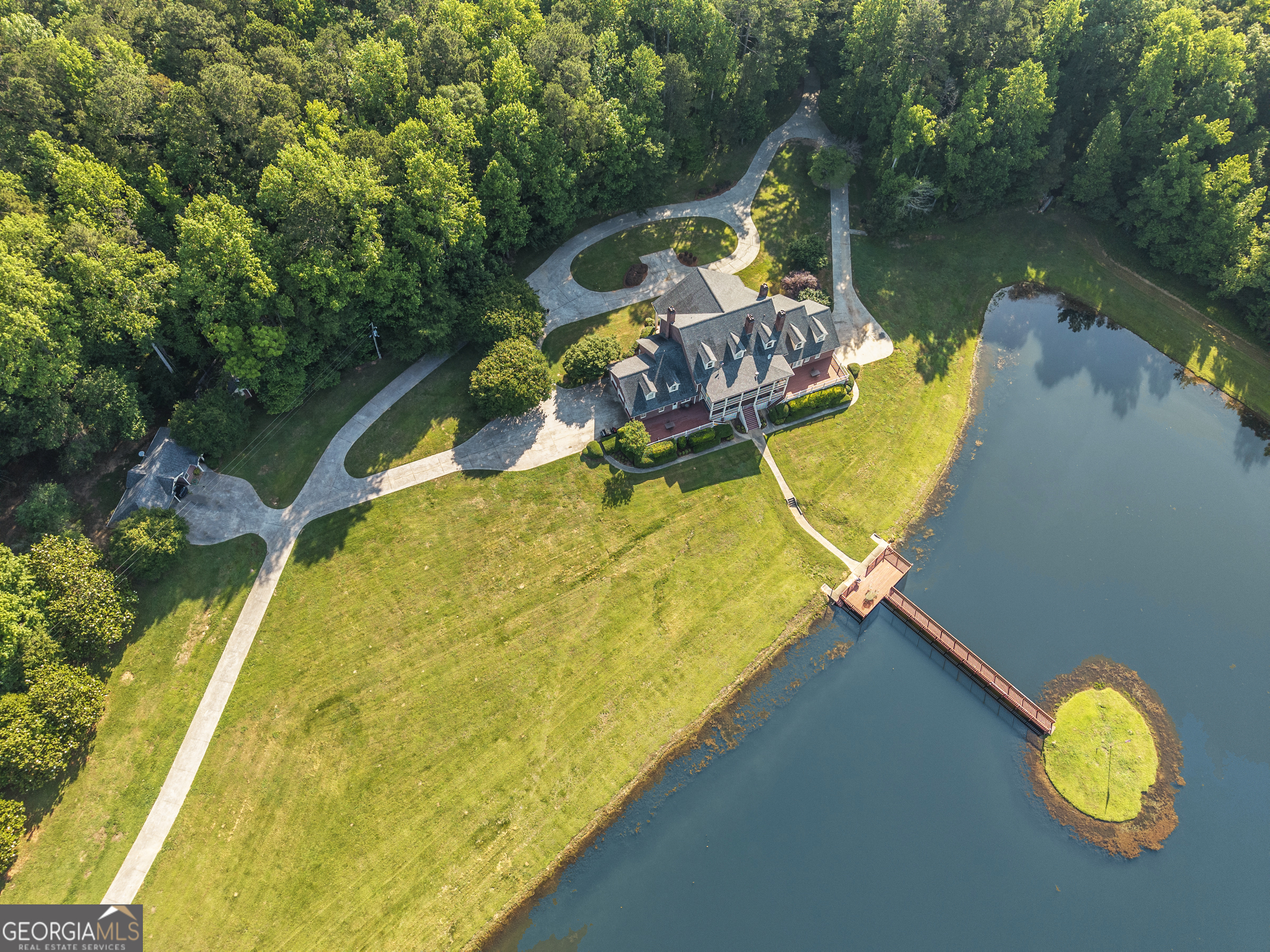 0 Doster Road, Unit 2720 Madison, GA 30650 - Photo 17 of 62 a view of a swimming pool with a garden