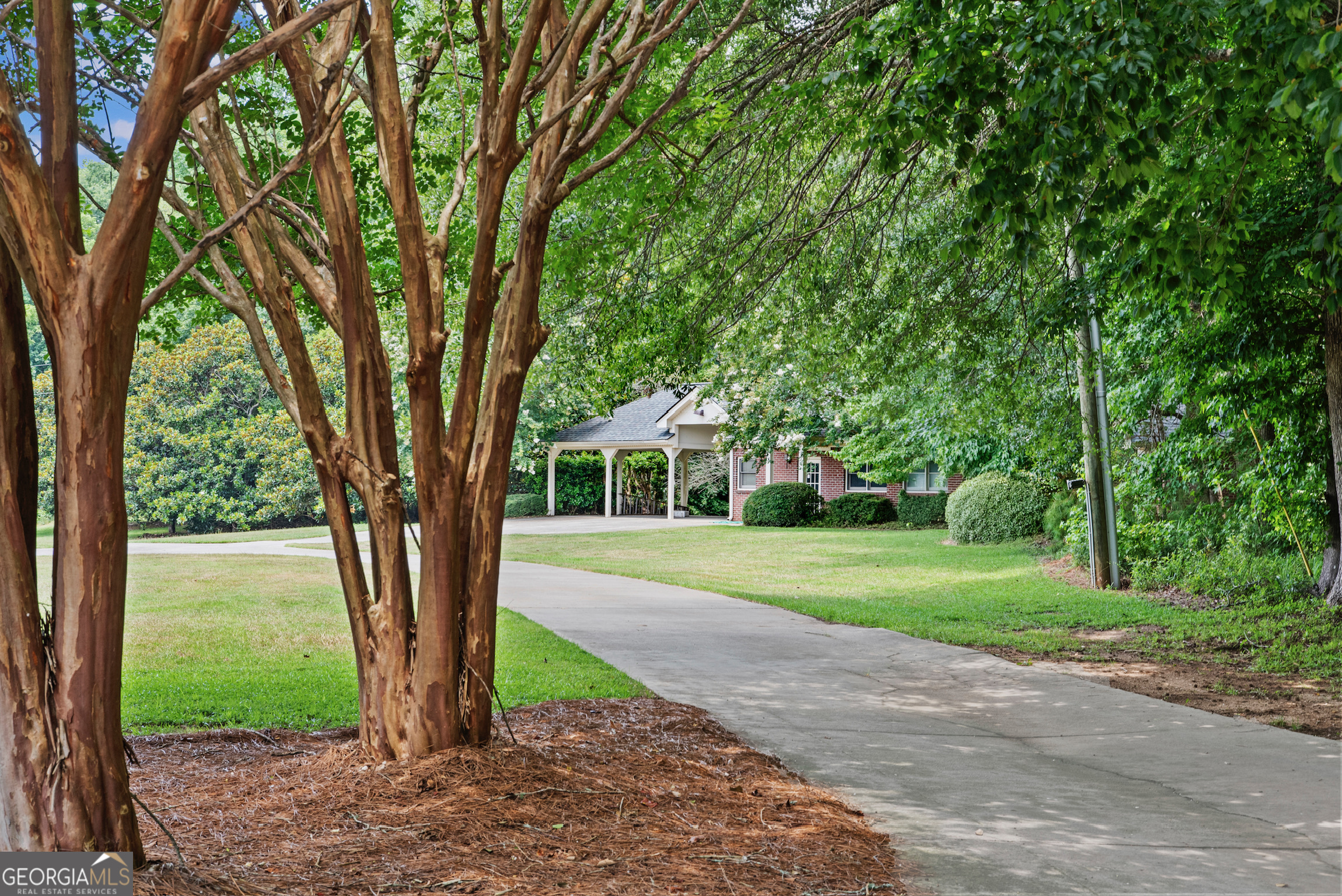 0 Doster Road, Unit 2720 Madison, GA 30650 - Photo 26 of 62 a view of a house with a yard