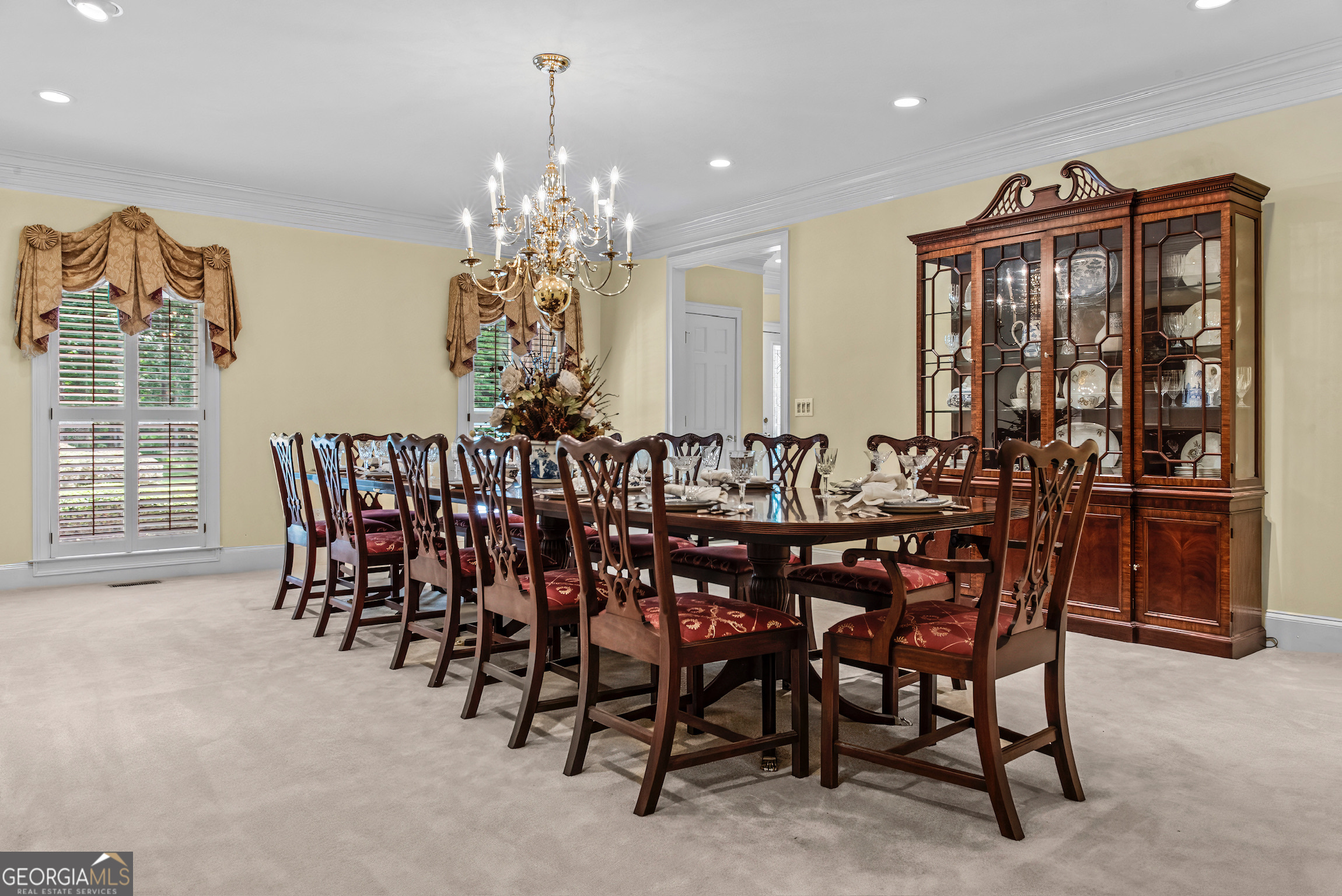 0 Doster Road, Unit 2720 Madison, GA 30650 - Photo 31 of 62 a view of a dining room with furniture and chandelier