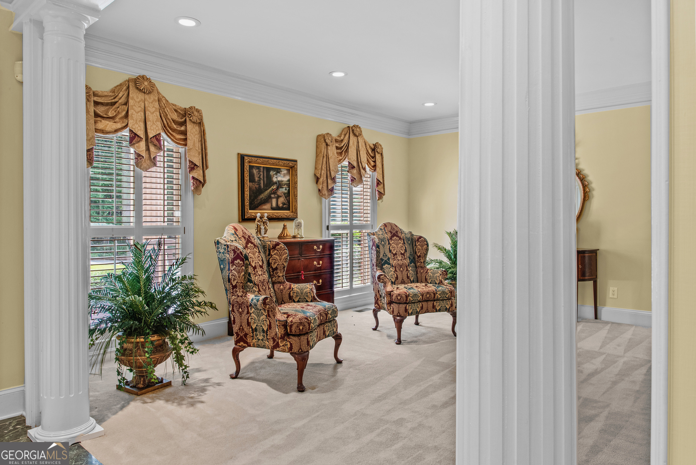 0 Doster Road, Unit 2720 Madison, GA 30650 - Photo 35 of 62 a view of a hallway with dining area and glass door
