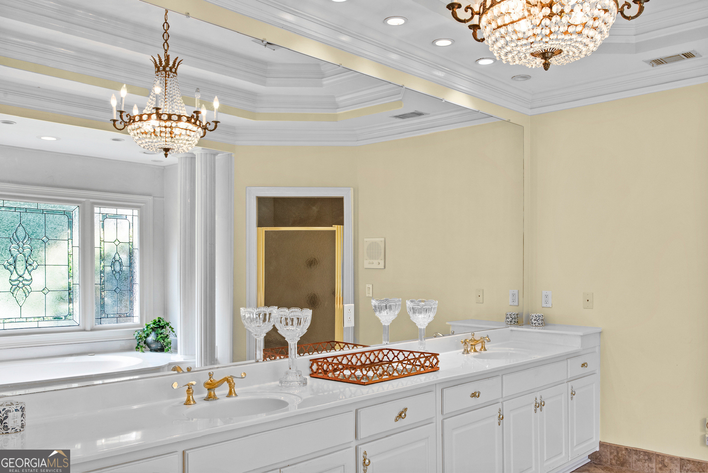 0 Doster Road, Unit 2720 Madison, GA 30650 - Photo 48 of 62 a spacious bathroom with a double vanity sink and a mirror