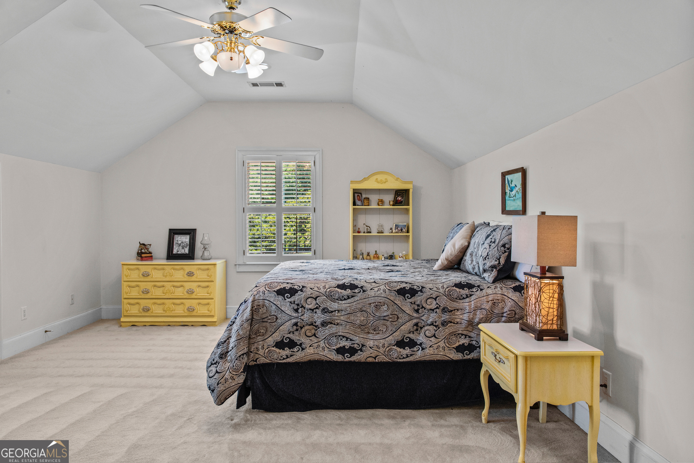 0 Doster Road, Unit 2720 Madison, GA 30650 - Photo 55 of 62 a bed sitting in a bedroom next to a window