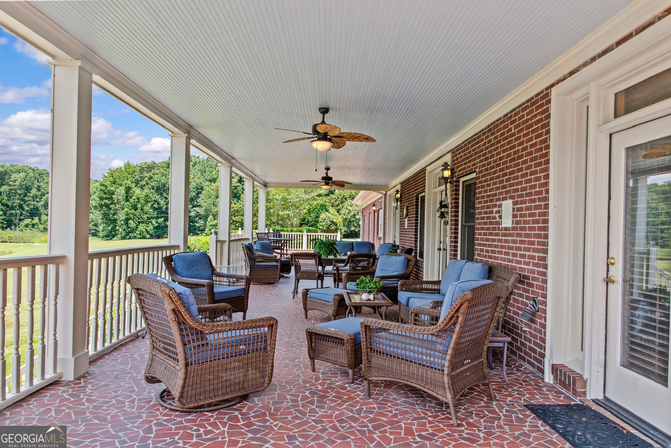 0 Doster Road, Unit 2720 Madison, GA 30650 - Photo 61 of 62 a living room with furniture and a large window