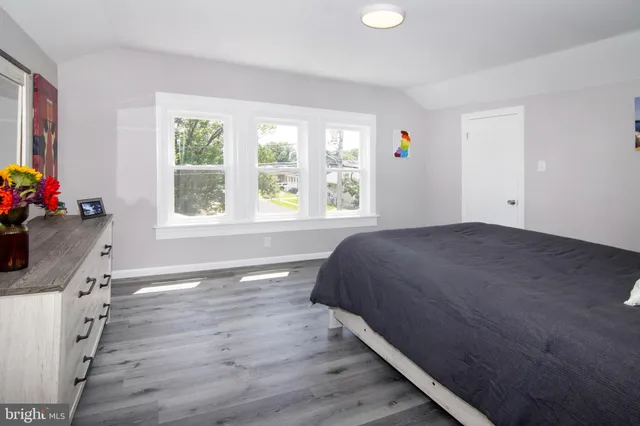 a bathroom with a toilet a sink and a shower