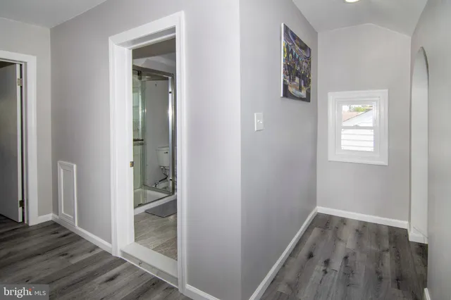 a view of a house with wooden deck
