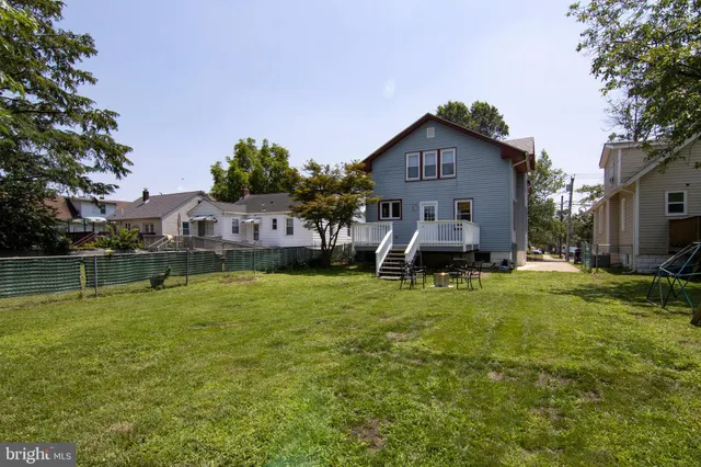 a house with trees in the background