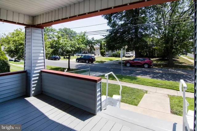 a view of swimming pool with a patio