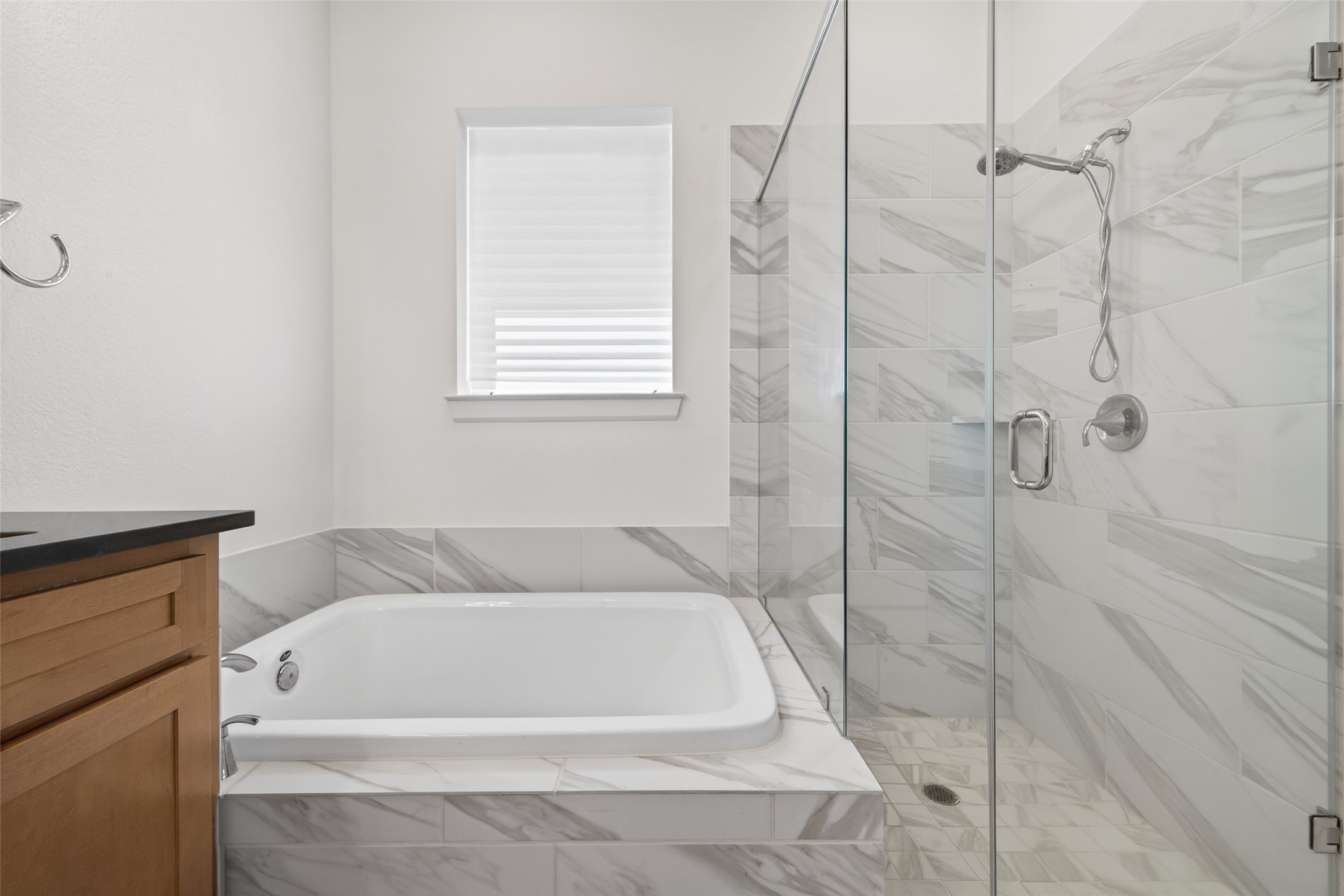 211 Amaranth Way Richmond, TX 77406 - Photo 23 of 26 a bathroom with a bath tub and shower