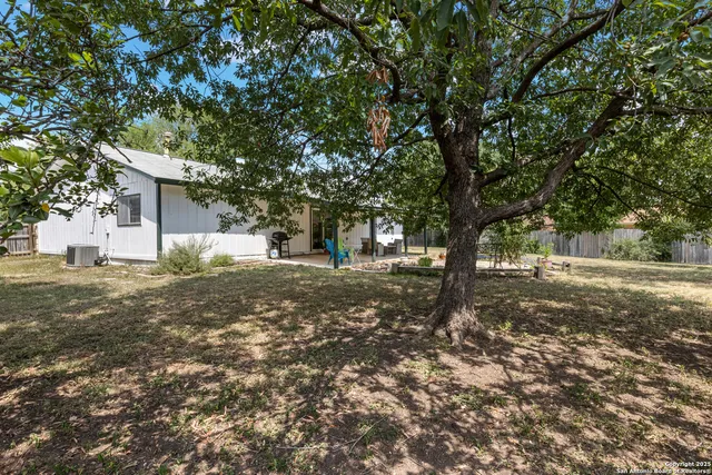 a view of a chairs and tables in the patio