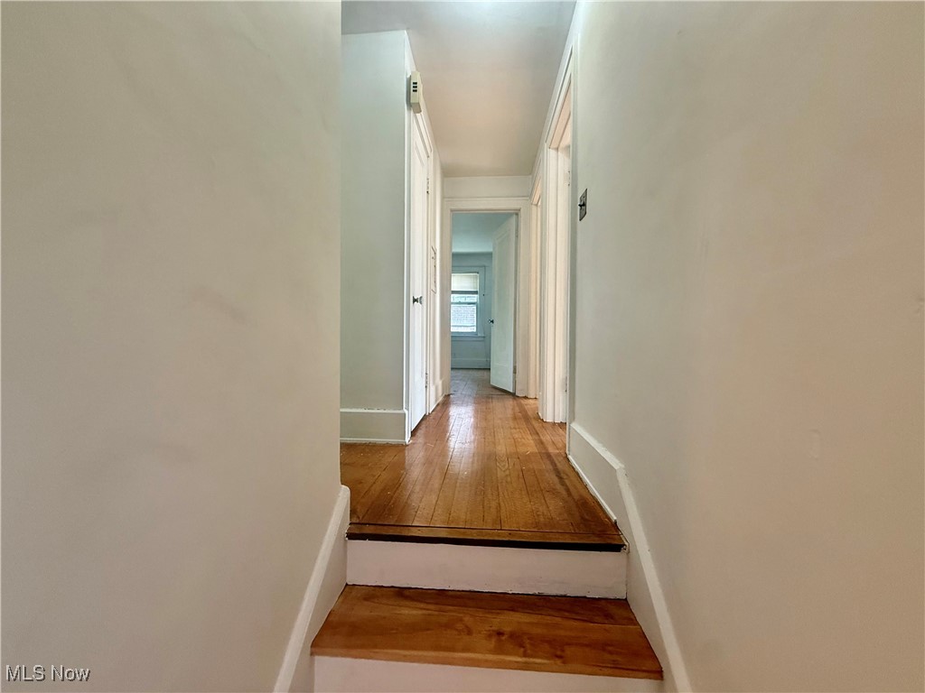 1979 Staunton Road Cleveland, OH 44118 - Photo 13 of 37 Hall with wood-type flooring and baseboards