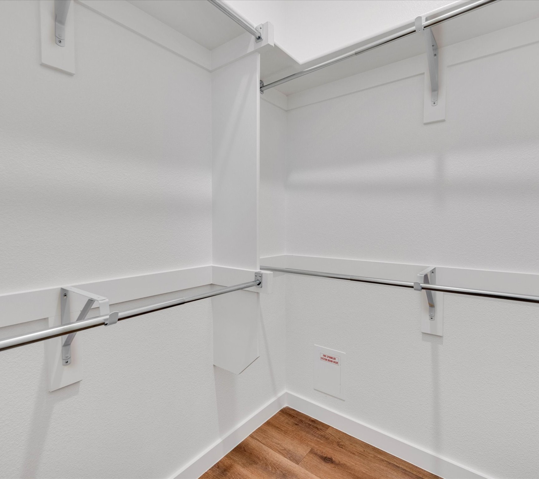 2709-825 Rockhill Road McKinney, TX 75072 - Photo 16 of 18 a view of an empty walk in closet