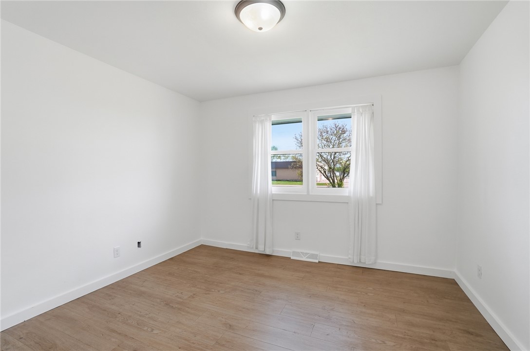 3991 Benner Road Miamisburg, OH 45342 - Photo 25 of 44 This bright room features a large window offering natural light and views of the neighborhood.