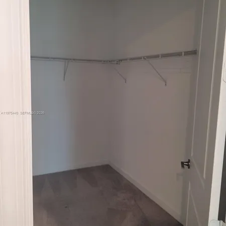 a view of a small space with a window