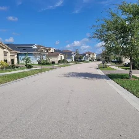 a view of a yard with a trampoline