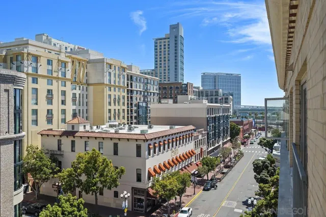a view of a city with tall buildings