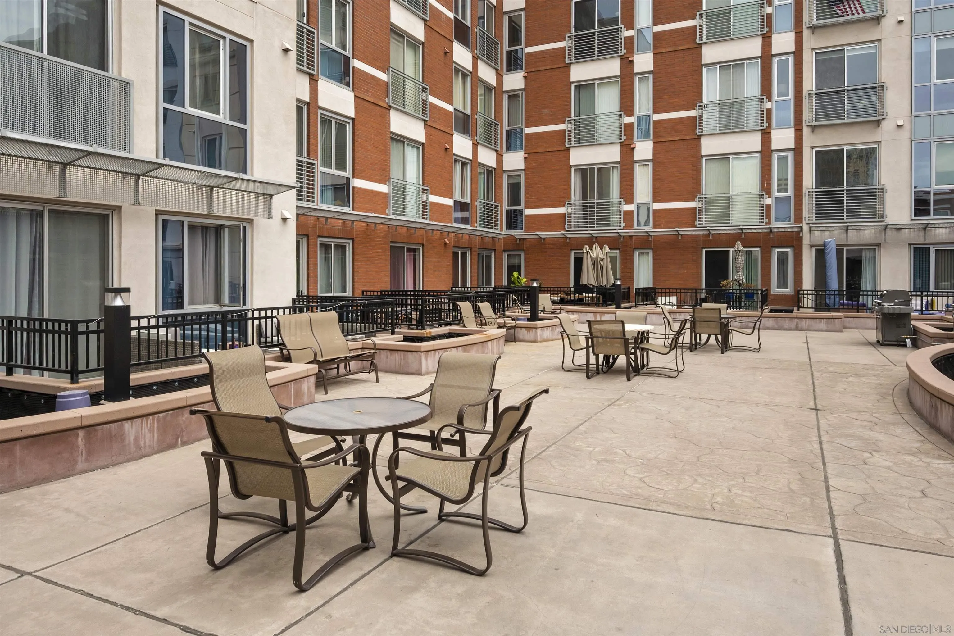 450 J Street, Unit 7071 San Diego, CA 92101 - Photo 27 of 33 a view of a building with sitting area