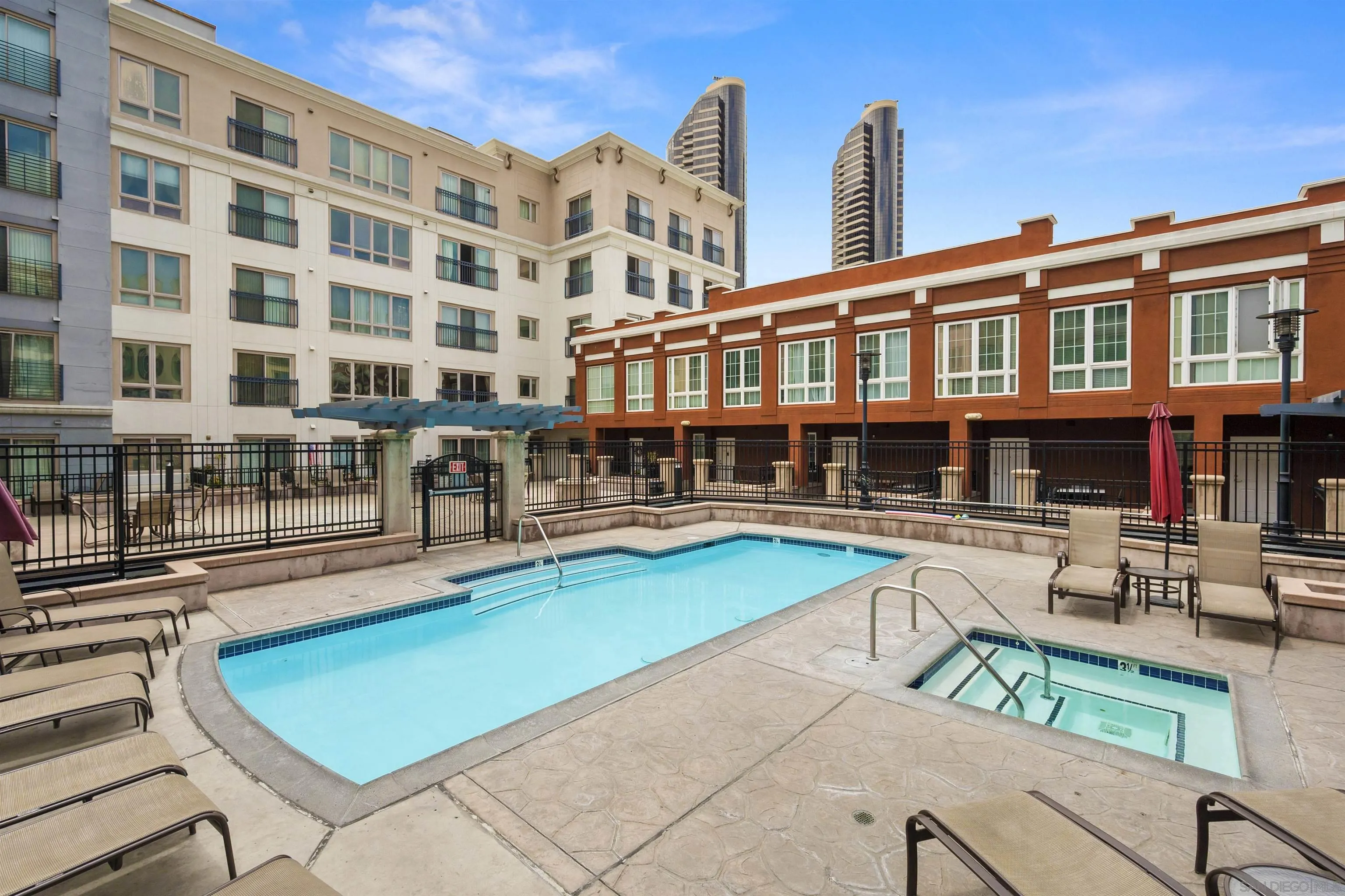 450 J Street, Unit 7071 San Diego, CA 92101 - Photo 29 of 33 a view of a swimming pool with outdoor seating
