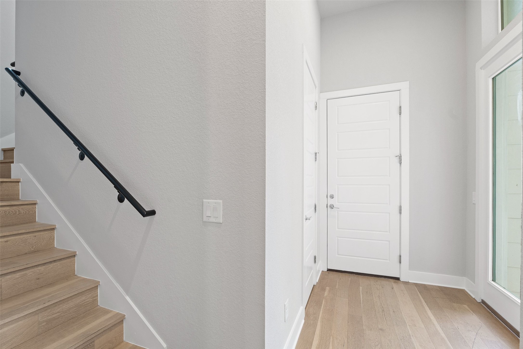 6104 Florencia Lane Austin, TX 78724 - Photo 12 of 31 Staircase featuring wood finished floors and baseboards