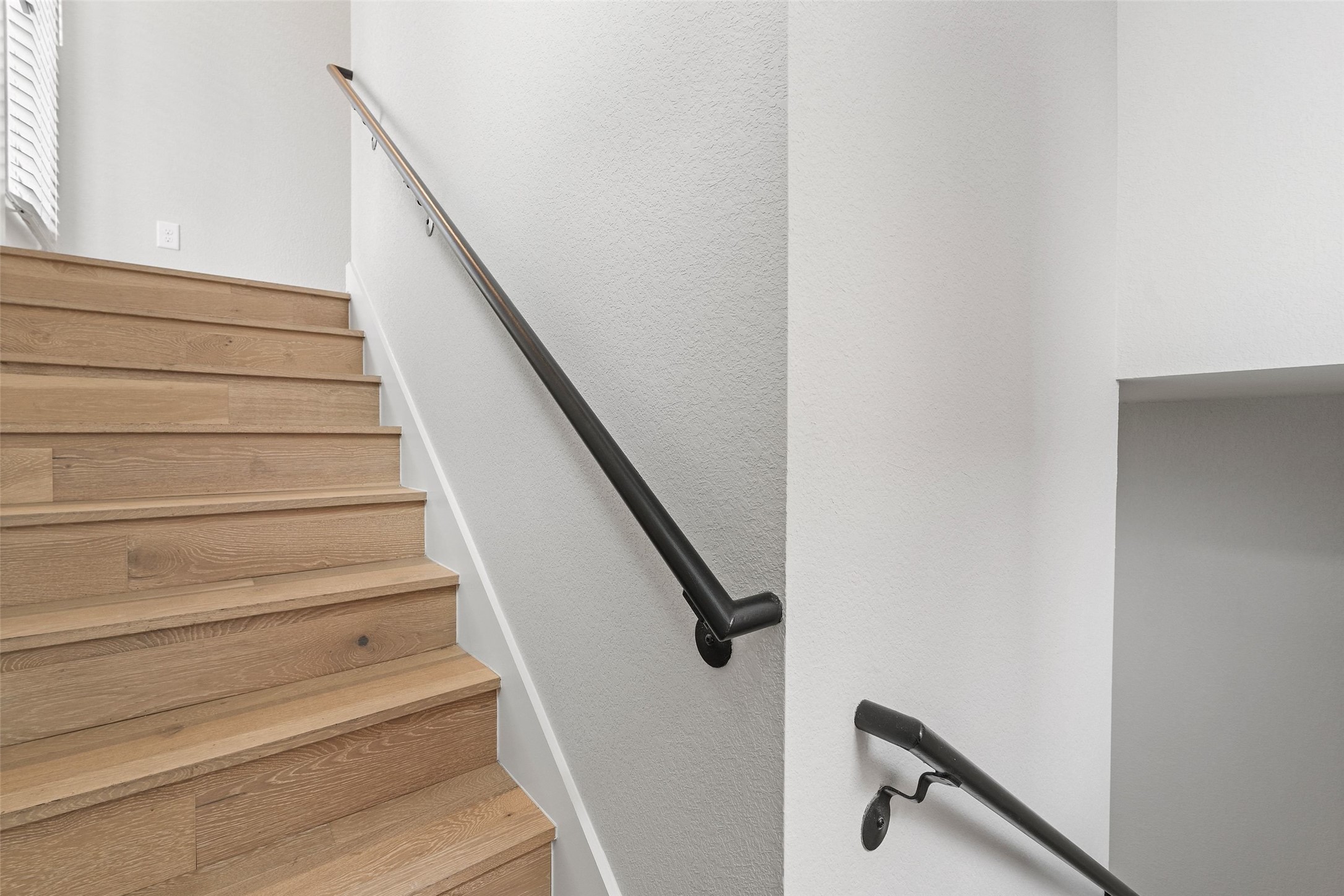 6104 Florencia Lane Austin, TX 78724 - Photo 13 of 31 Staircase featuring a textured wall