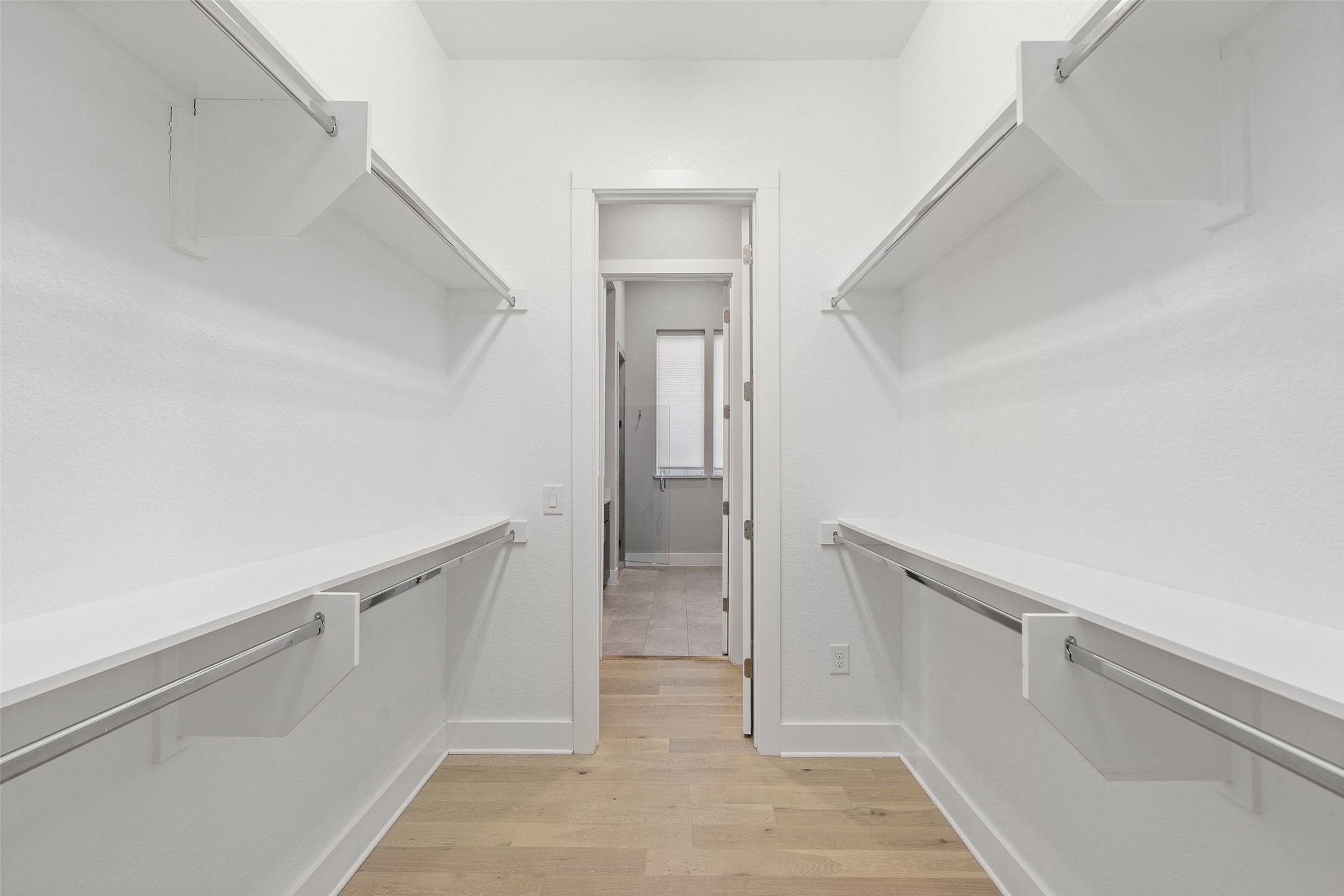 6104 Florencia Lane Austin, TX 78724 - Photo 17 of 31 Walk in closet with light wood finished floors