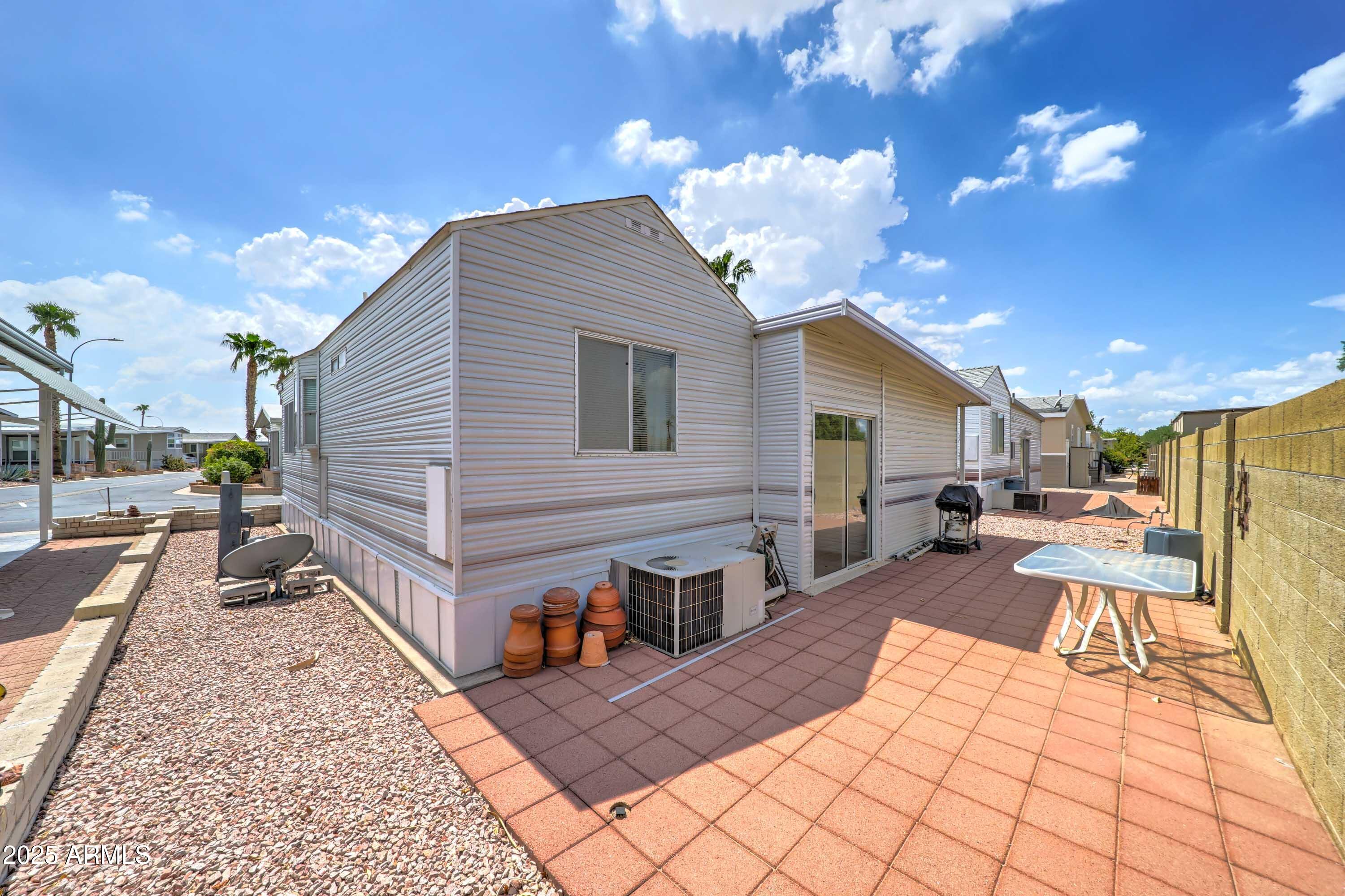 111 South Greenfield Road, Unit 822 Mesa, AZ 85206 - Photo 17 of 25 a view of a terrace with sitting area