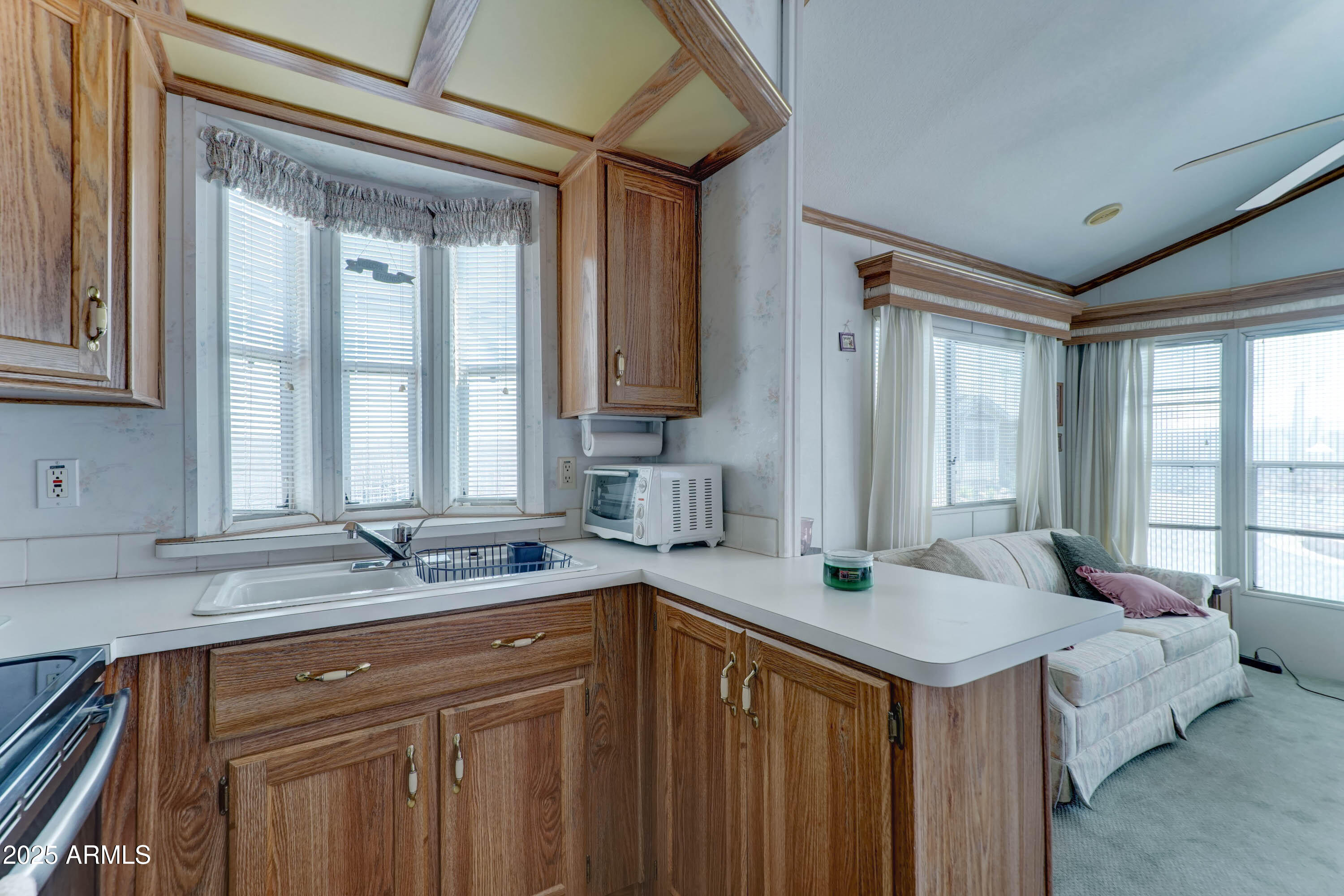 111 South Greenfield Road, Unit 822 Mesa, AZ 85206 - Photo 25 of 25 a kitchen with a sink and a window