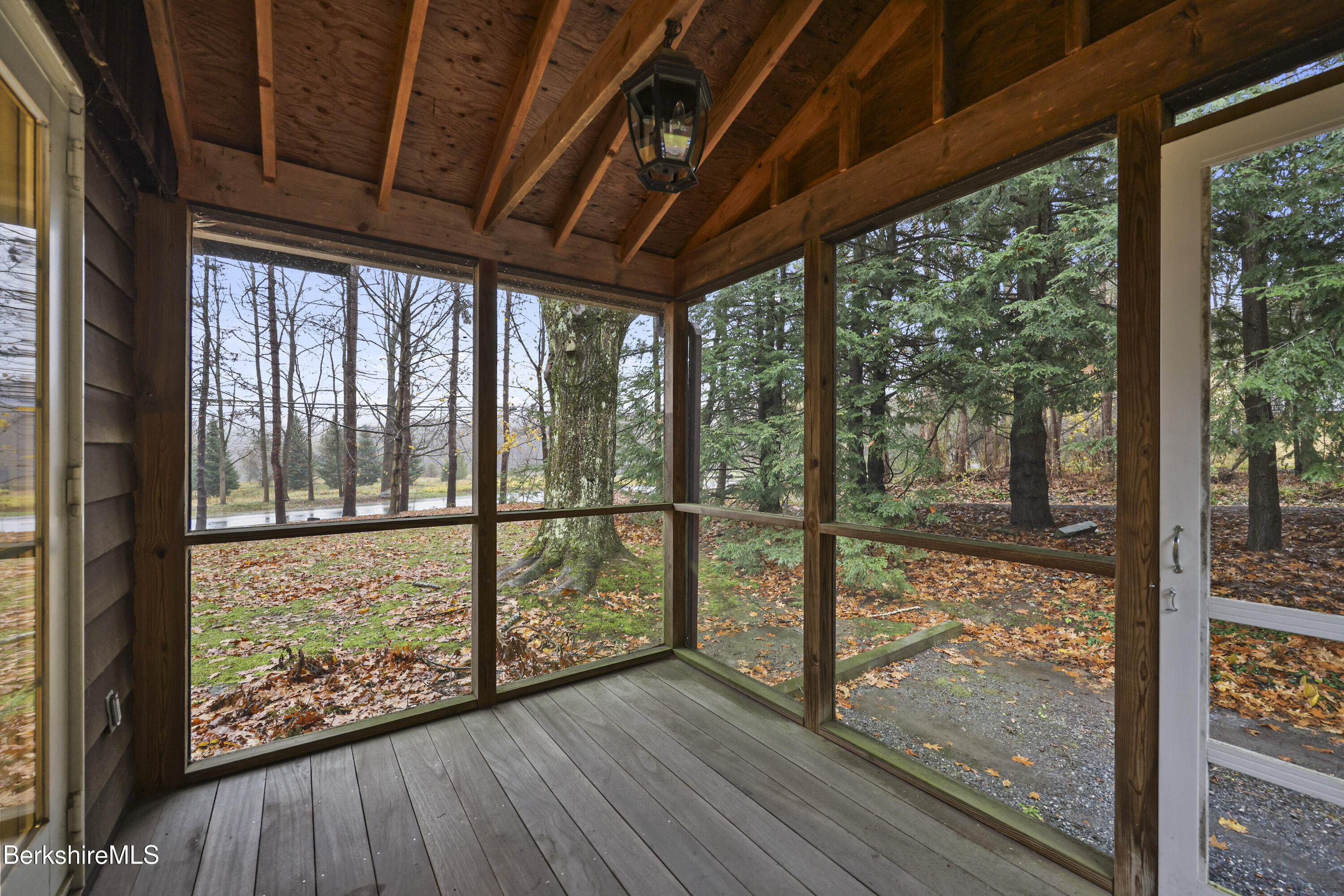 36 West Center Road West Stockbridge, MA 01266 - Photo 13 of 30 a view of porch with wooden floor and floor to ceiling window
