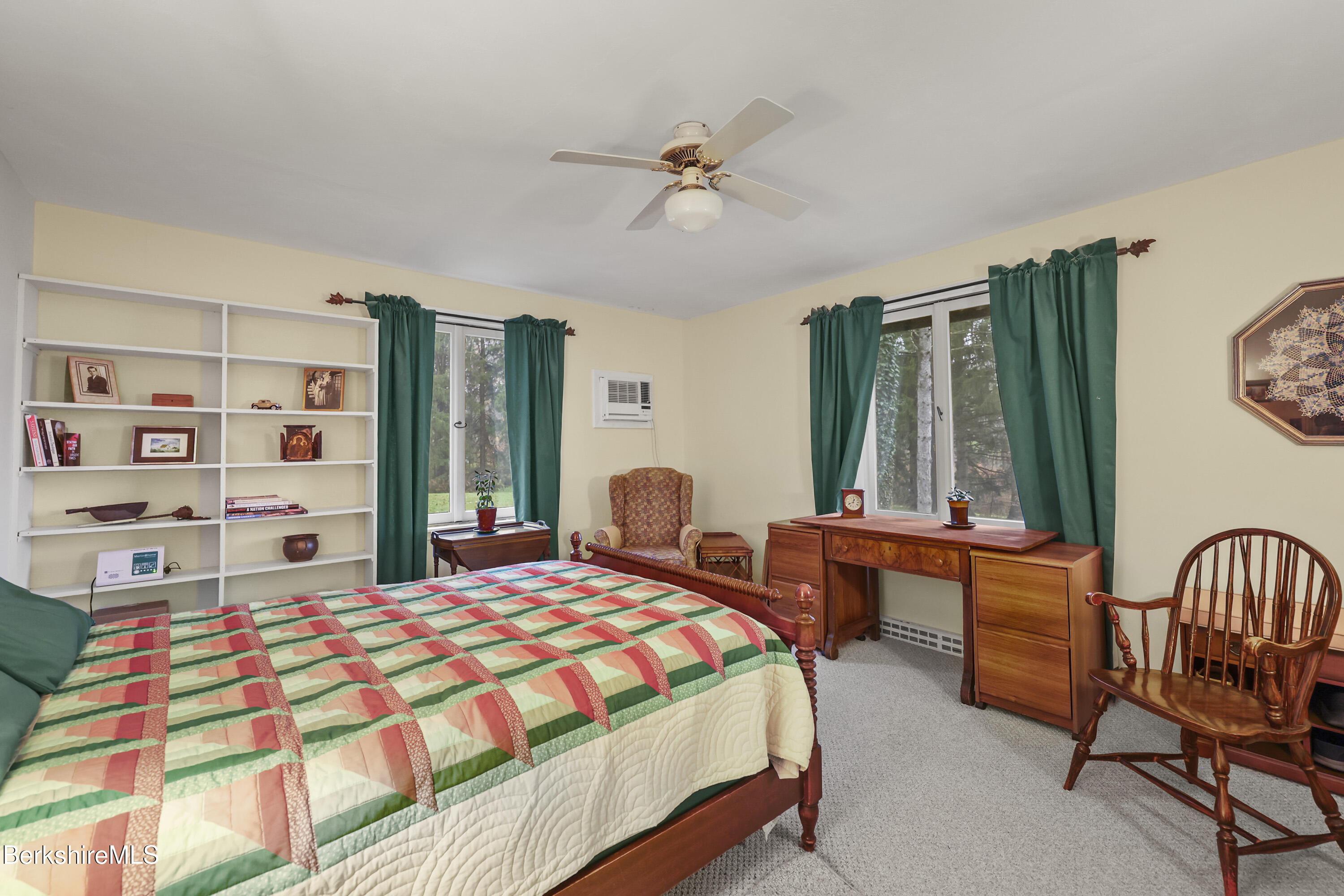 36 West Center Road West Stockbridge, MA 01266 - Photo 15 of 30 a bedroom with a bed and a chandelier