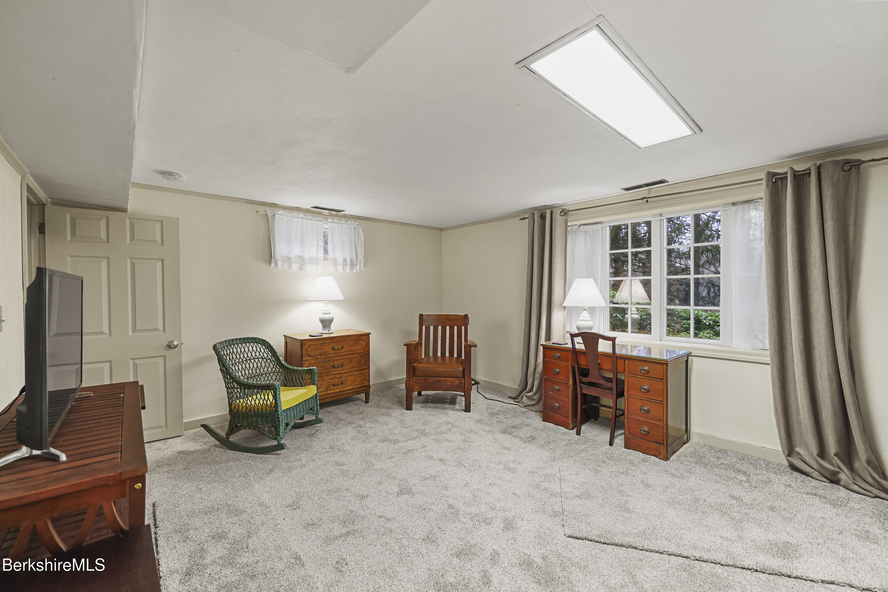 36 West Center Road West Stockbridge, MA 01266 - Photo 23 of 30 a living room with furniture and a flat screen tv