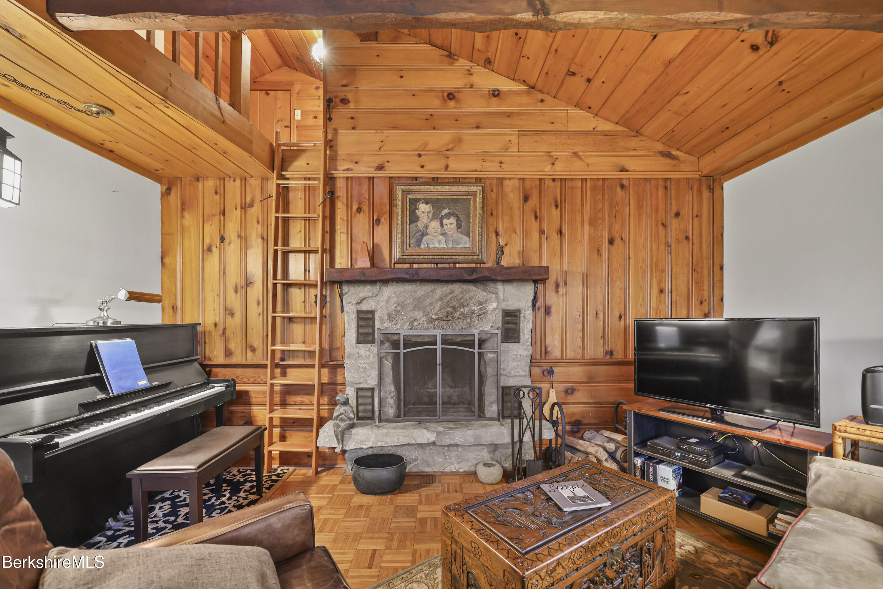 36 West Center Road West Stockbridge, MA 01266 - Photo 8 of 30 a living room with furniture and a flat screen tv