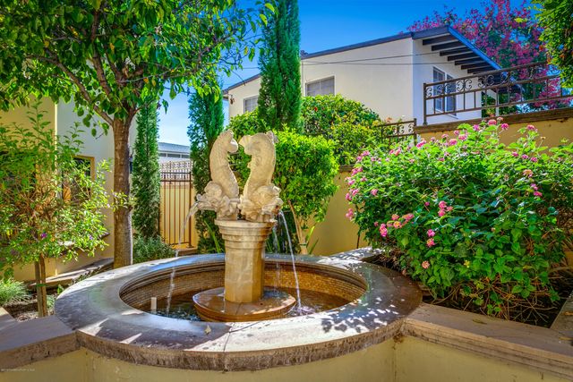 a sign on a pole on a street