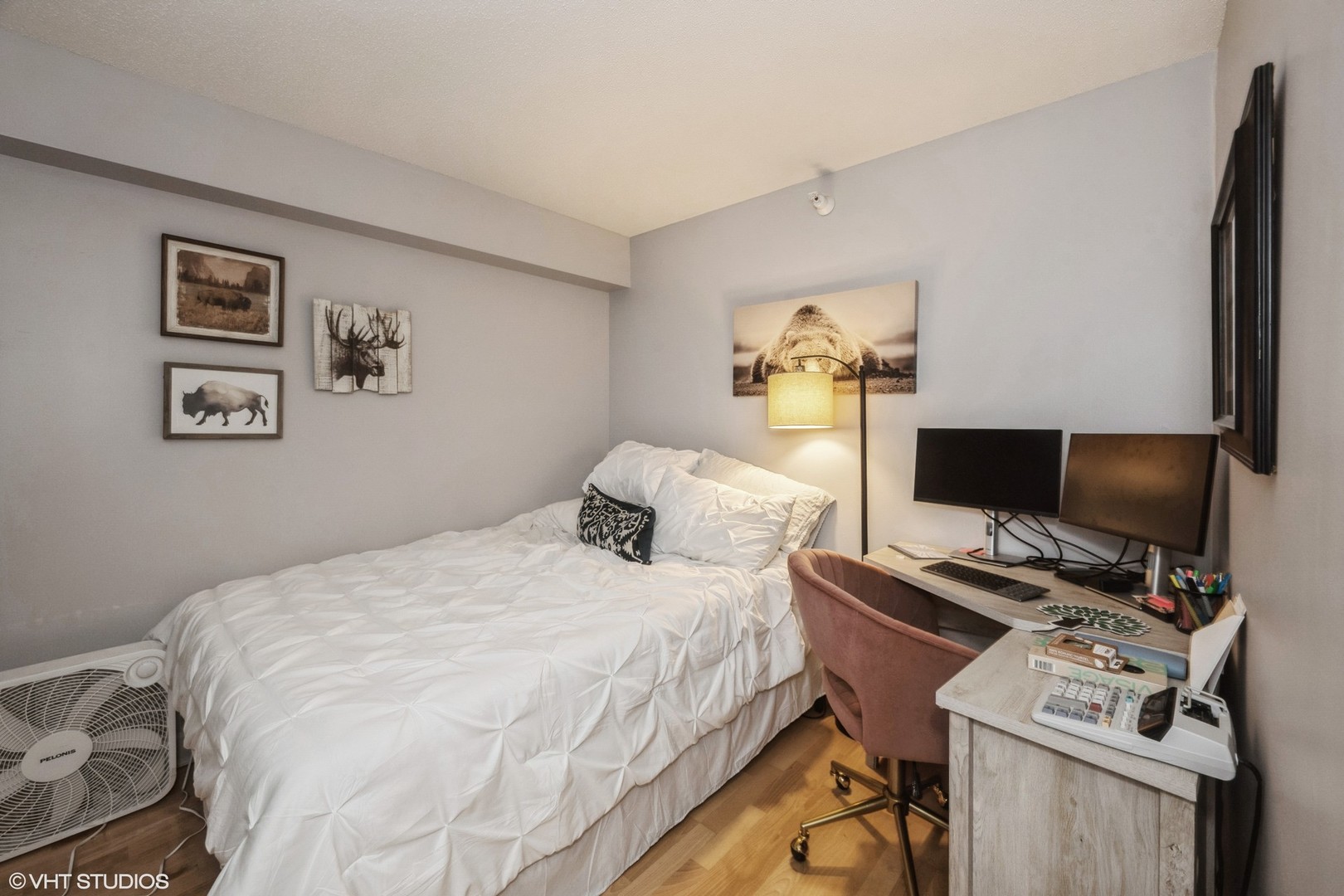 2 East Erie Street, Unit 1606 Chicago, IL 60611 - Photo 10 of 13 a bedroom with a bed and a flat screen tv