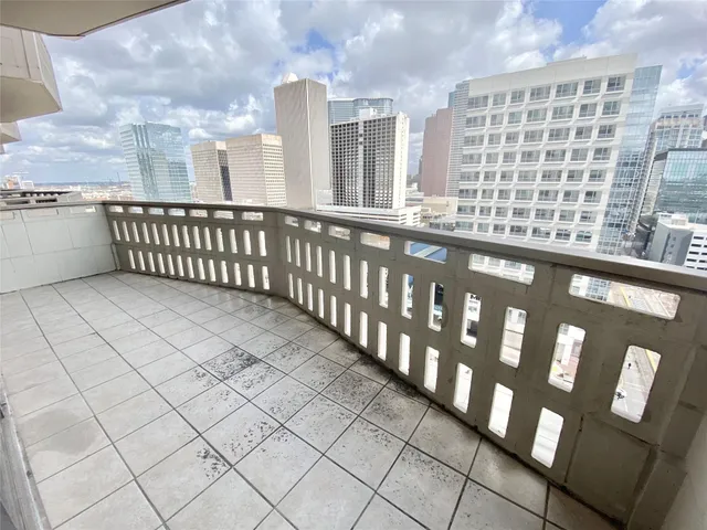 a view of a city from a balcony