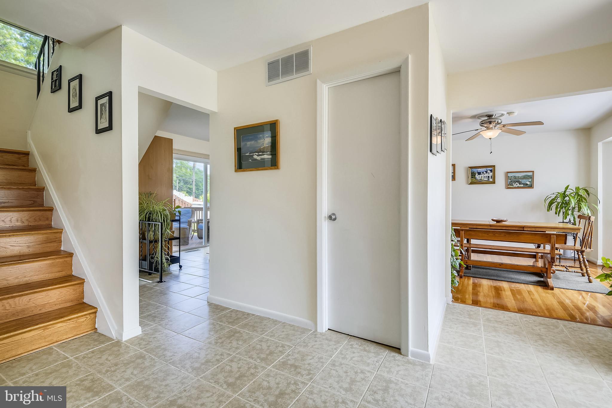 Spacious front foyer with coat closet