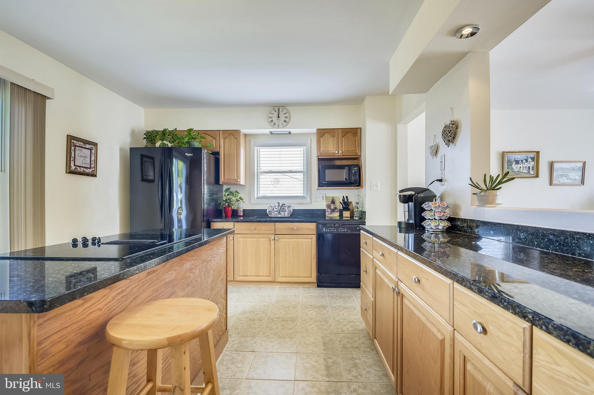 Large updated kitchen with granite...