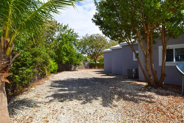 a backyard of a house with lots of green space