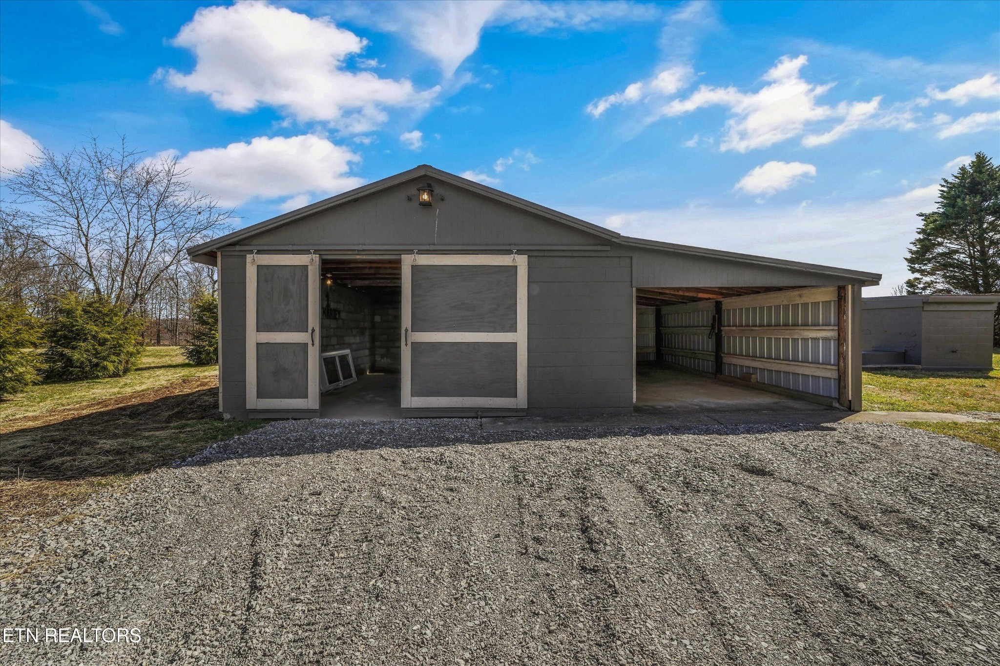 3138 Carpenters Grade Road Maryville, TN 37803 - Photo 14 of 45 a front view of a house with a yard and garage