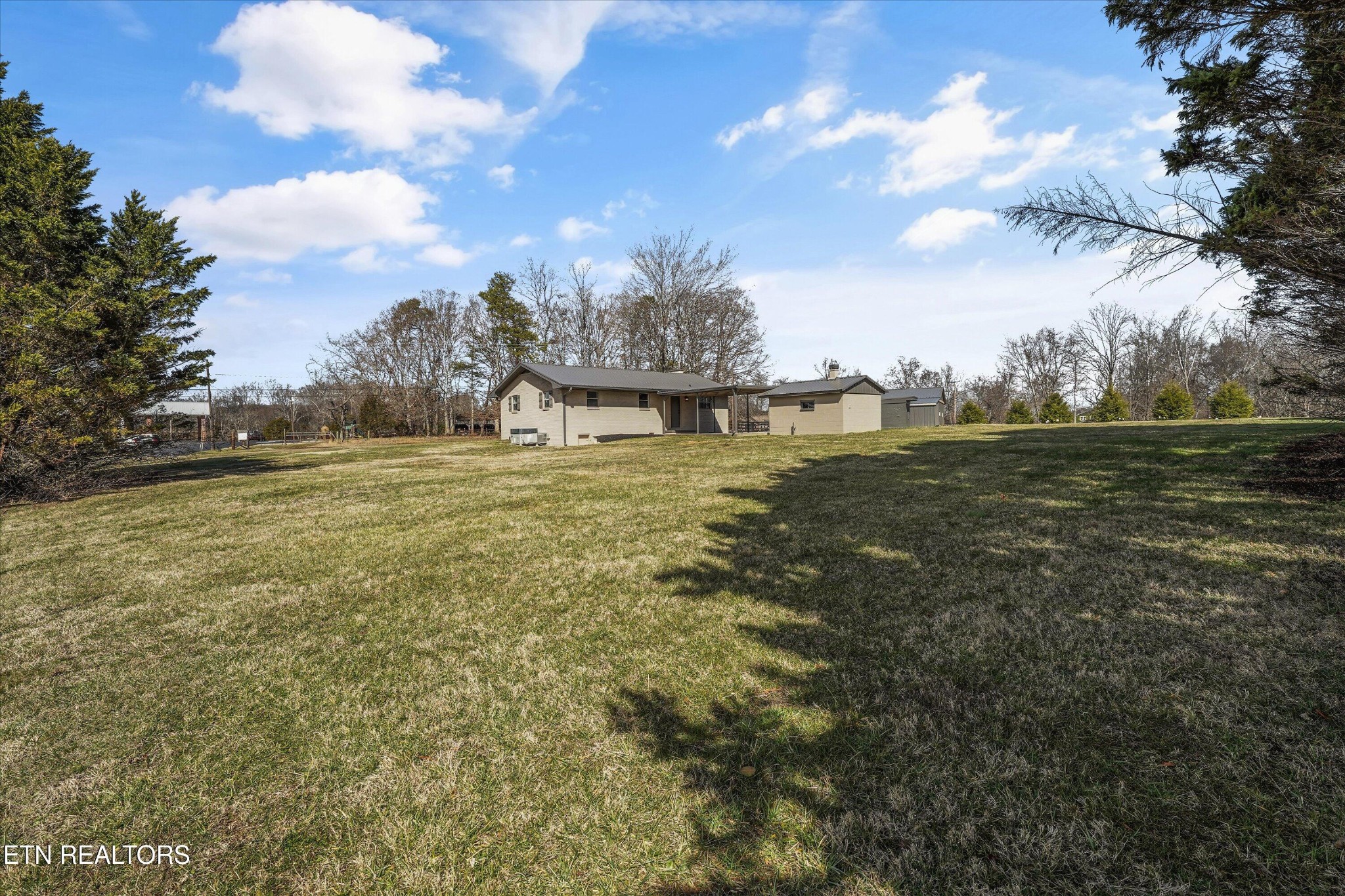 3138 Carpenters Grade Road Maryville, TN 37803 - Photo 16 of 45 a view of a field with an trees in front of it