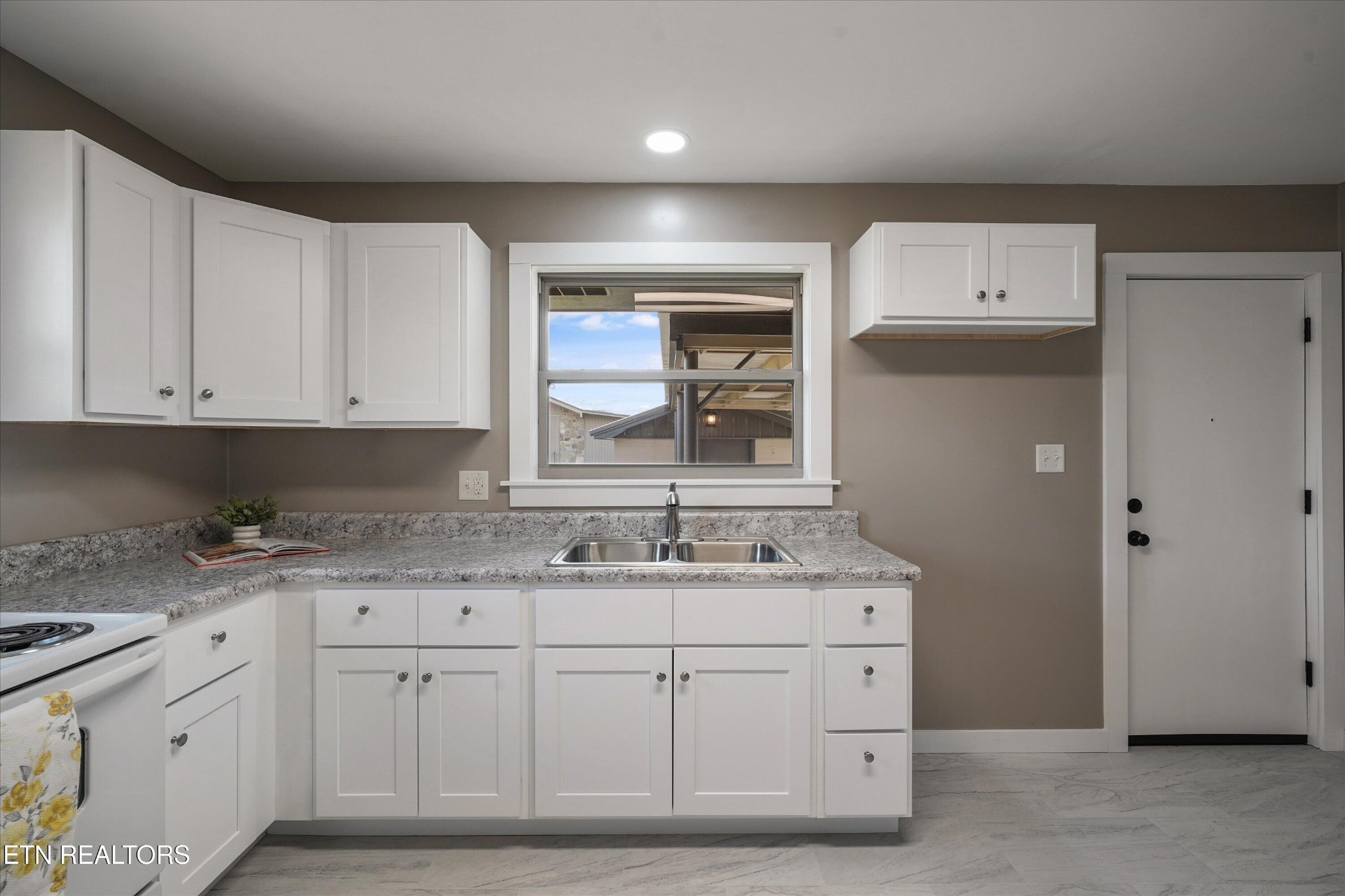 3138 Carpenters Grade Road Maryville, TN 37803 - Photo 22 of 45 a spacious bathroom with a granite countertop sink and a mirror