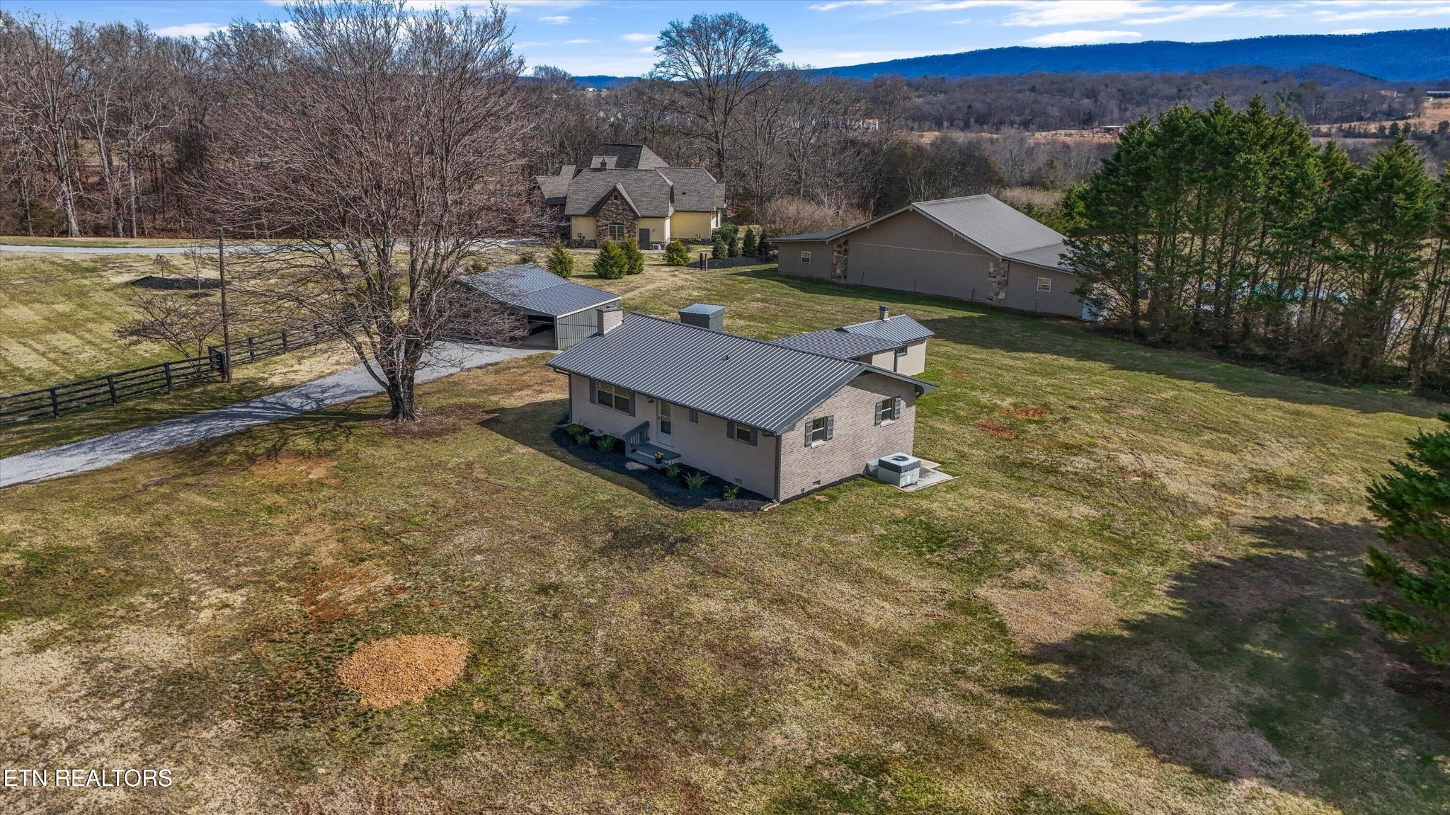 3138 Carpenters Grade Road Maryville, TN 37803 - Photo 3 of 45 a view of a house with a yard and sitting area