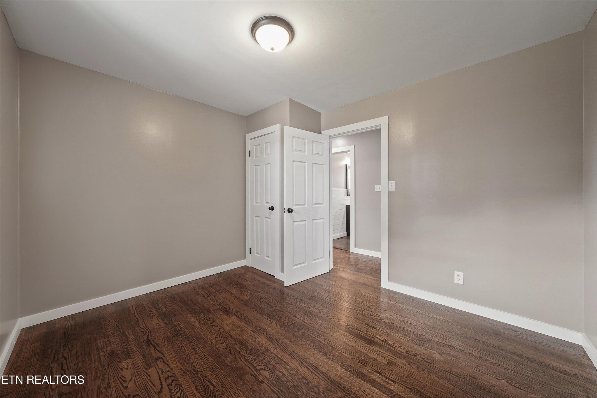 3138 Carpenters Grade Road Maryville, TN 37803 - Photo 35 of 45 a view of an empty room with wooden floor