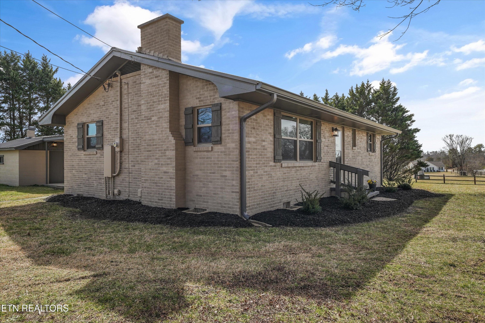 3138 Carpenters Grade Road Maryville, TN 37803 - Photo 7 of 45 a front view of a house with garden