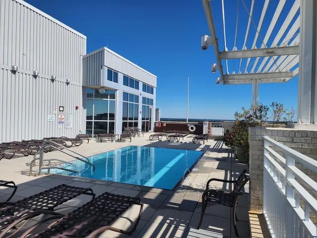 a view of gallery with wooden floor