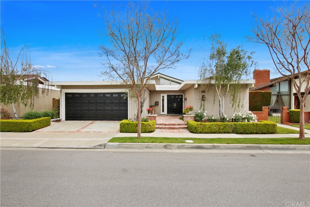 19402 Sierra Chula Road Irvine, CA 92603 - Photo 1 of 1 a front view of a house with a yard and garage