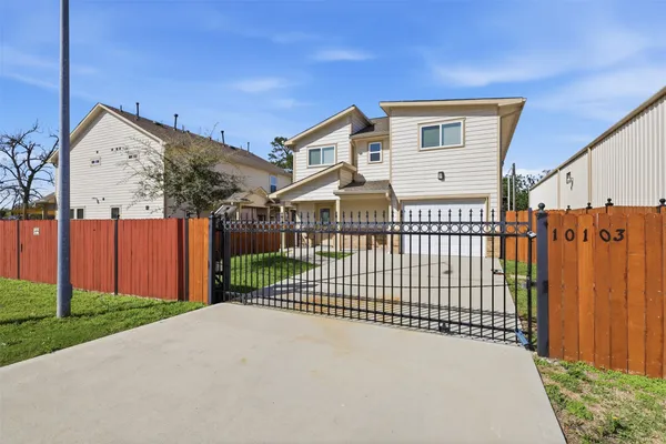 a view of a street with a building in the background