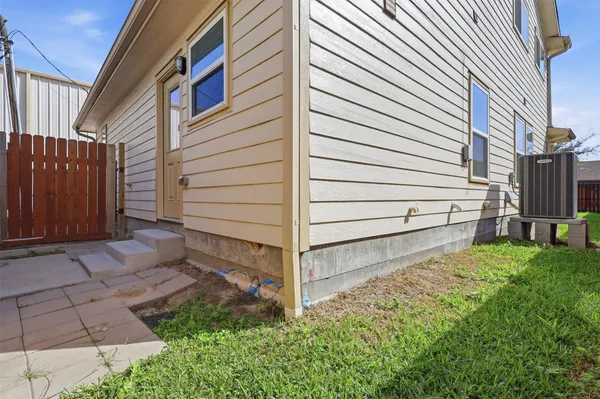 a view of a back yard of the house