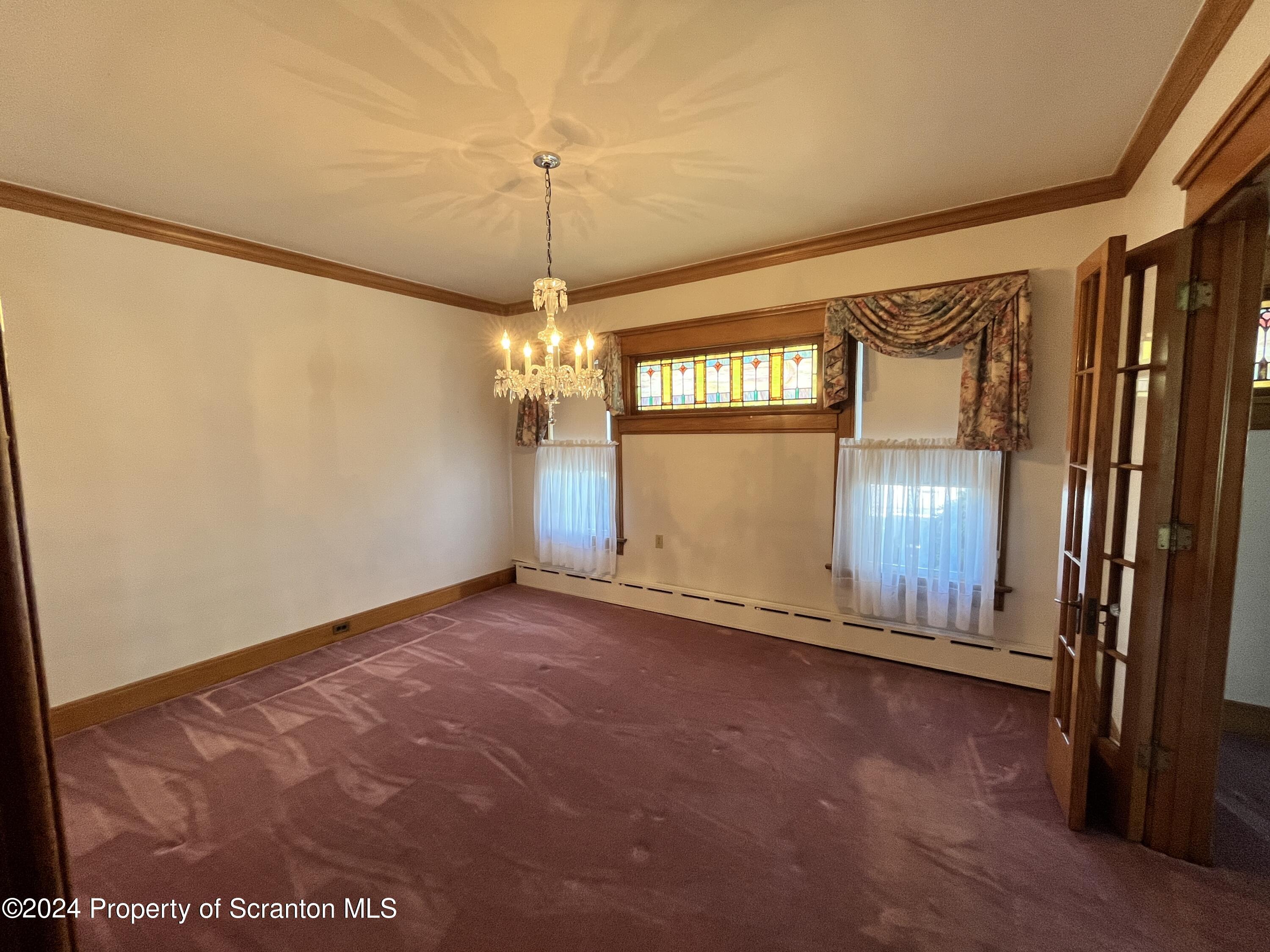 2002 Green Ridge Street Dunmore, PA 18512 - Photo 11 of 43 a view of an empty room with a window