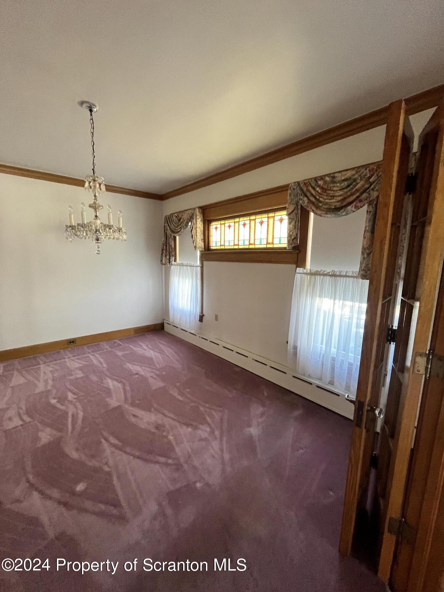 2002 Green Ridge Street Dunmore, PA 18512 - Photo 12 of 43 a view of an empty room with a window