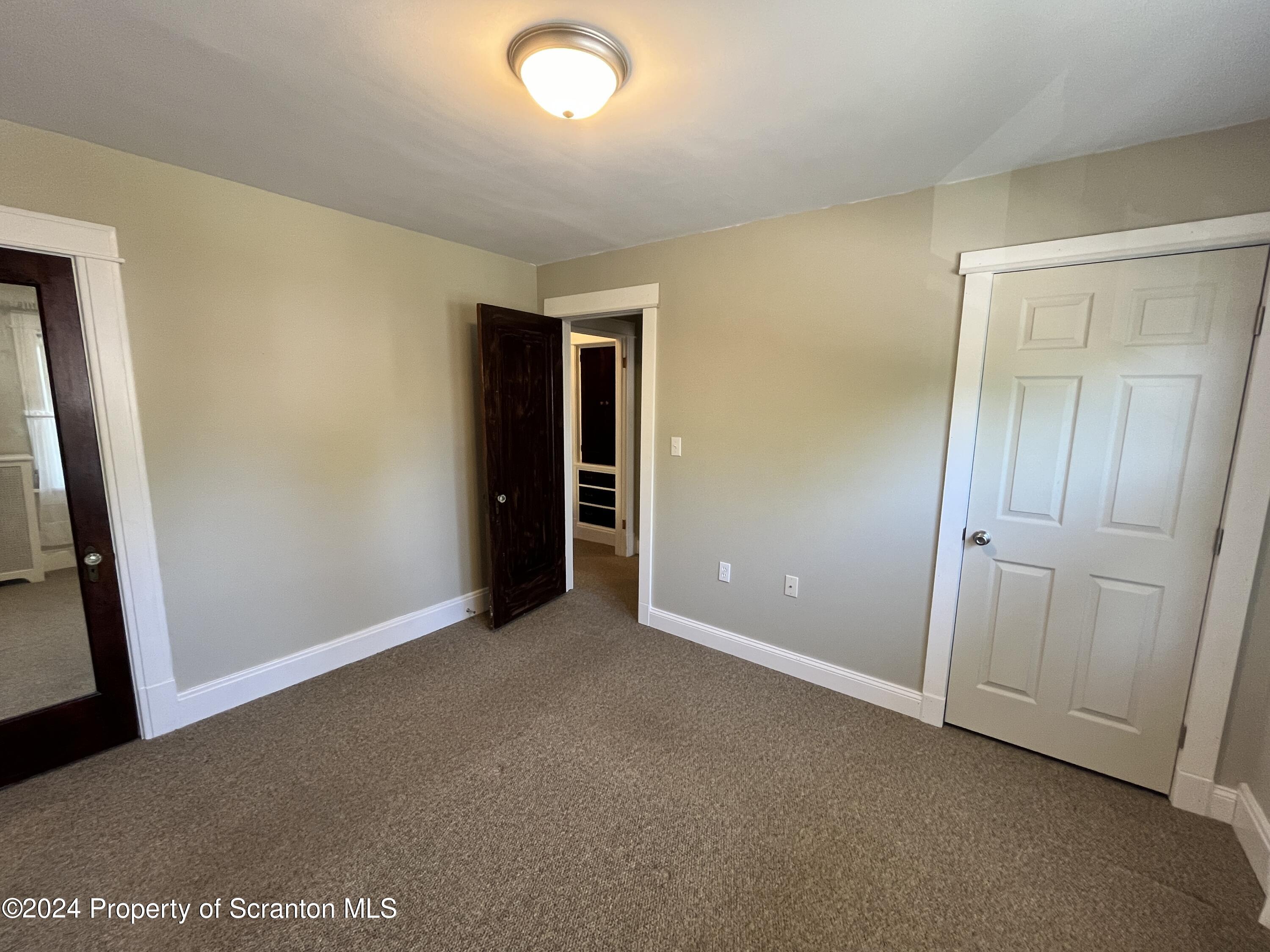 2002 Green Ridge Street Dunmore, PA 18512 - Photo 17 of 43 an empty room with closet